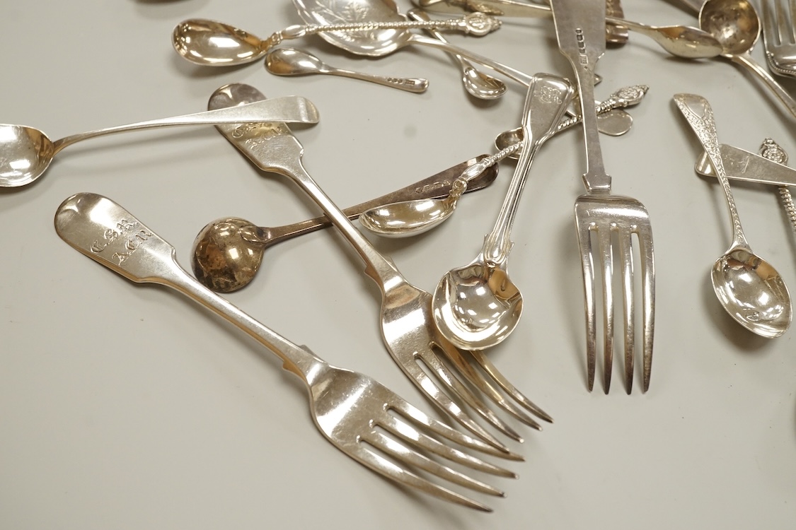 A small collection of assorted mainly 19th century silver flatware, including teaspoons, dessert forks, condiment spoons, serving spoon, etc. various dates and makers, 21.6oz.